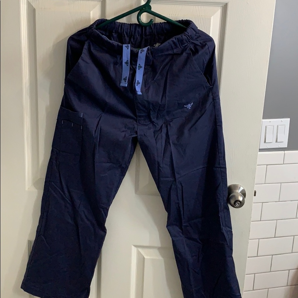 4 XS Navy scrub pants (3 used, 1  New  )